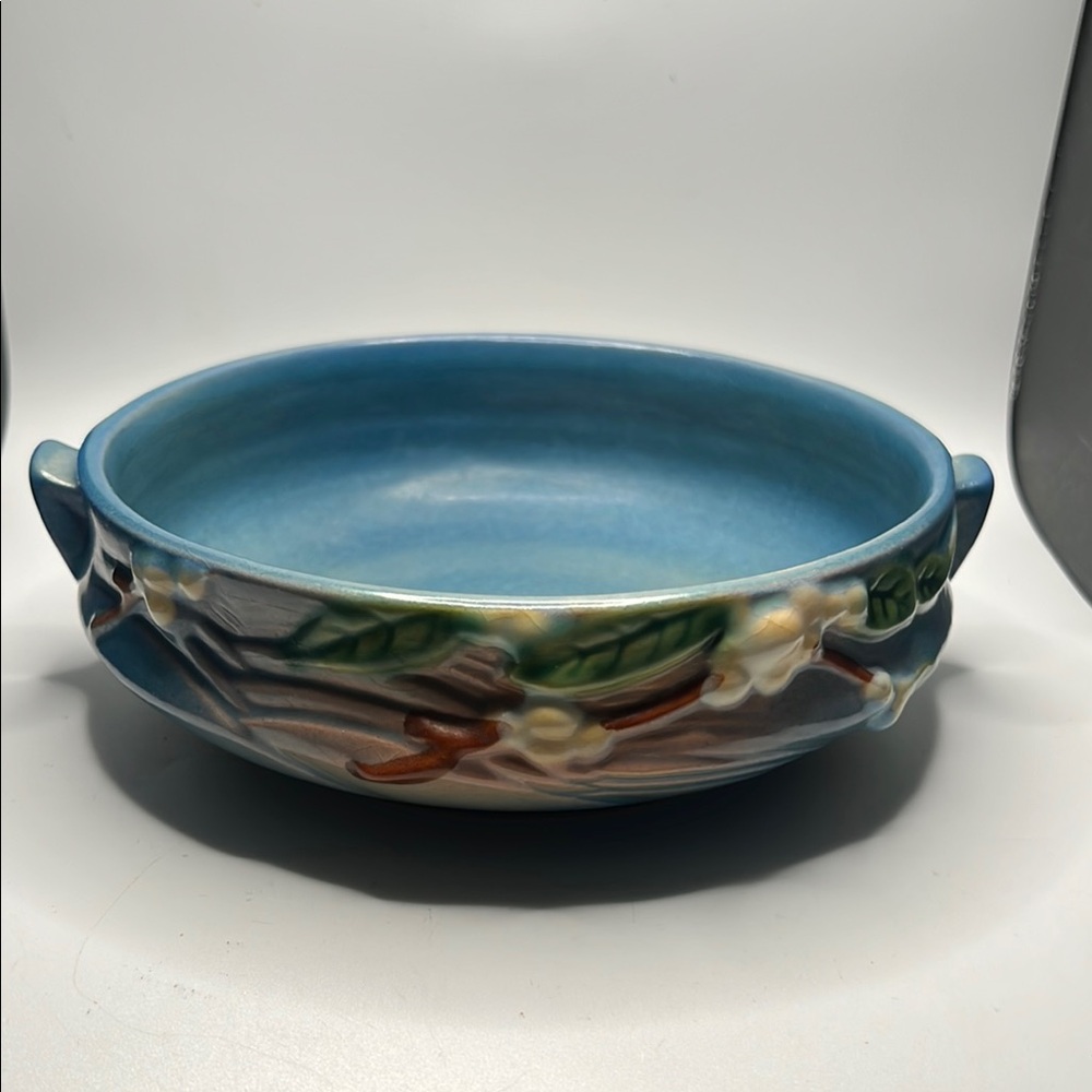 Roseville Pottery Snowberry vintage blue low bowl dating back to 1947.